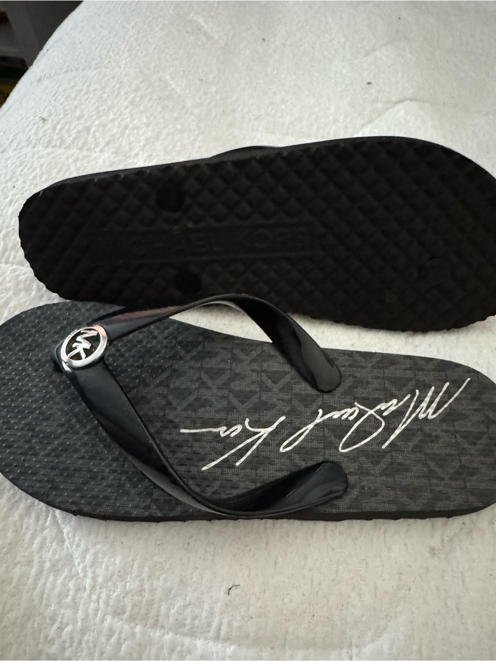 Michael Kors women’s  Black Logo Flip Flop Sandals